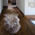 Arthur Cameron Genuine Double-Fleece Sheepskin Rug with a
