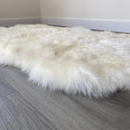Arthur Cameron Genuine Double-Fleece Sheepskin Rug with a