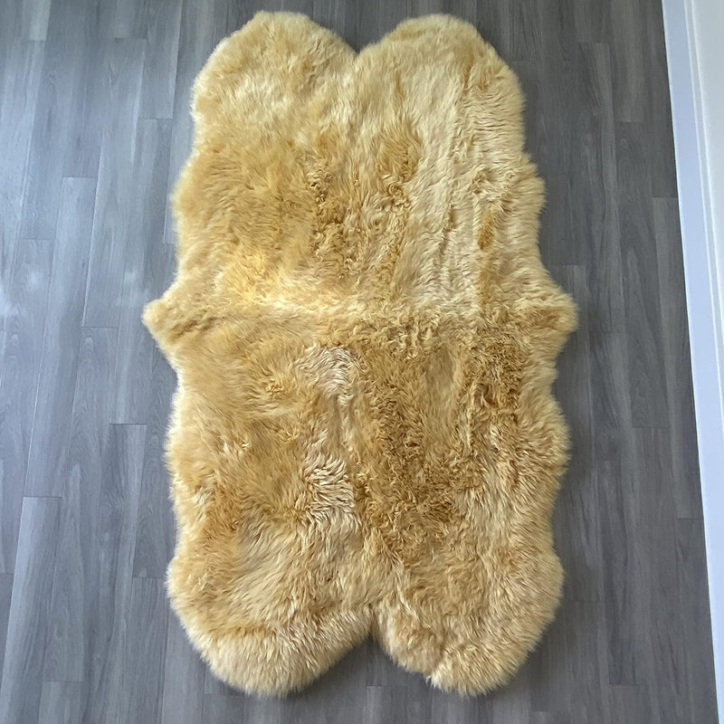 Arthur Cameron Genuine Double-Fleece Sheepskin Rug with a