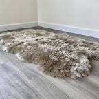 Arthur Cameron Genuine Double-Fleece Sheepskin Rug with a