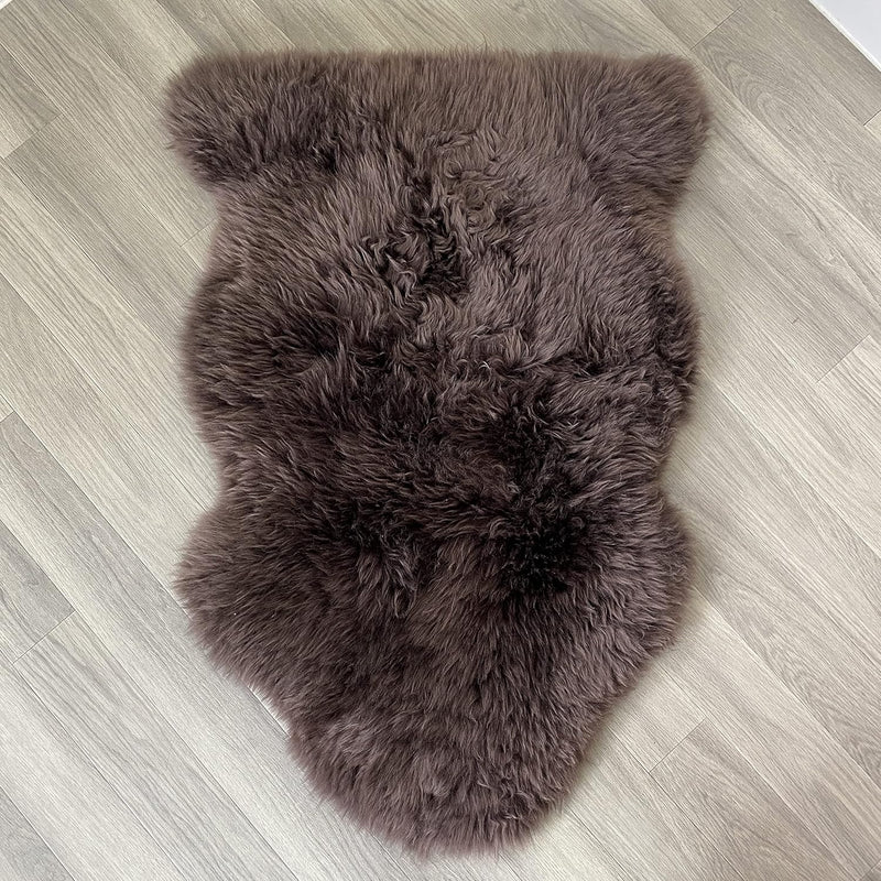 Arthur Cameron Genuine Double-Fleece Sheepskin Rug with a