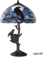 L50968 Raven Sitting on Bare Tree Branch