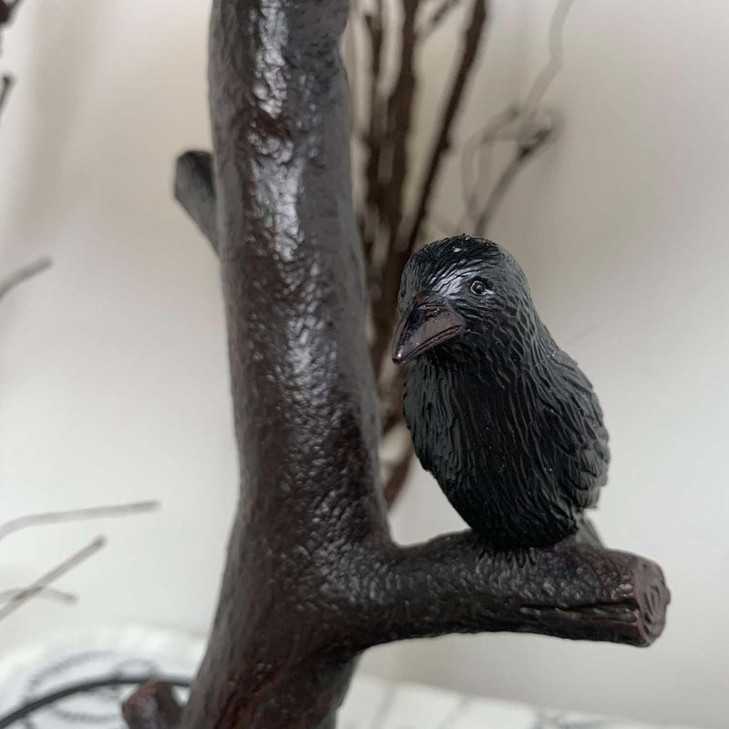 L50968 Raven Sitting on Bare Tree Branch