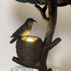 L50968 Raven Sitting on Bare Tree Branch