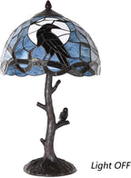 L50968 Raven Sitting on Bare Tree Branch