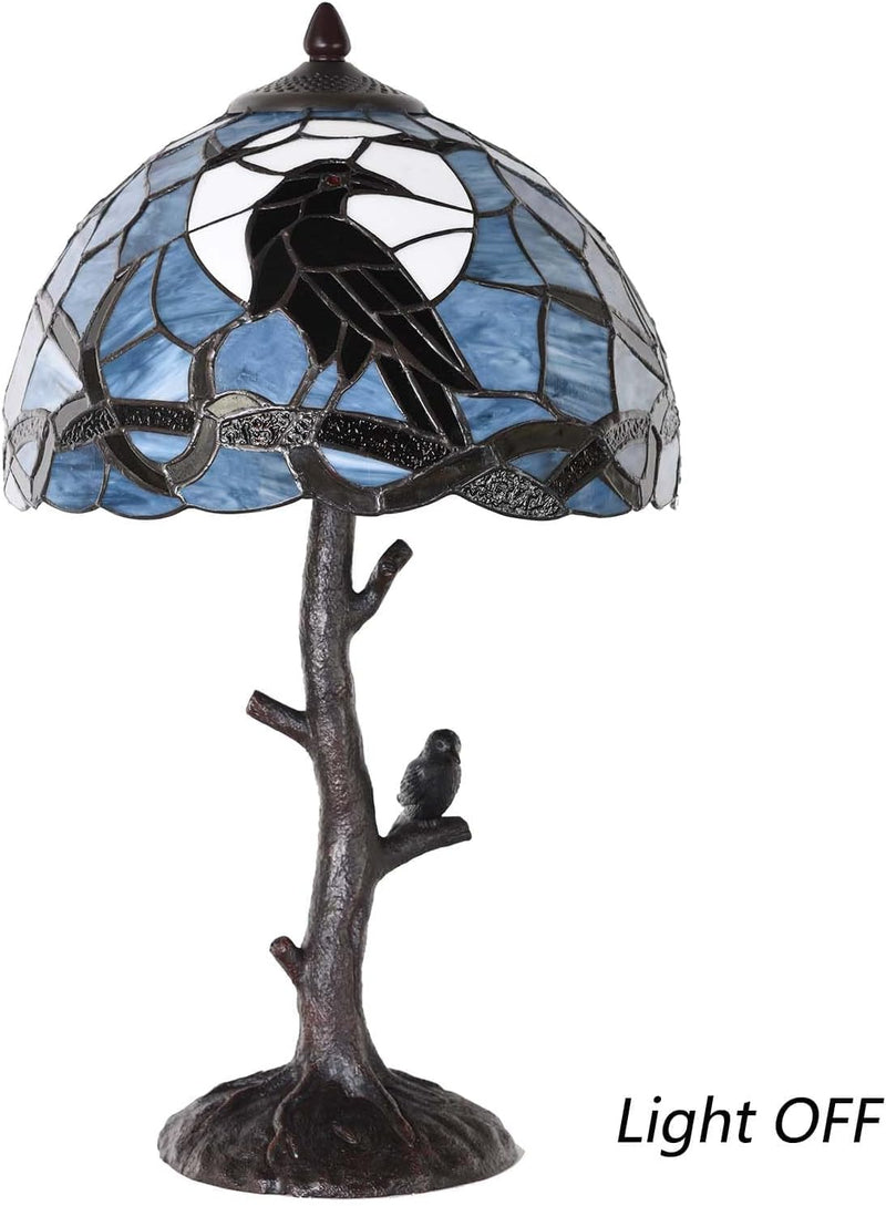 L50968 Raven Sitting on Bare Tree Branch