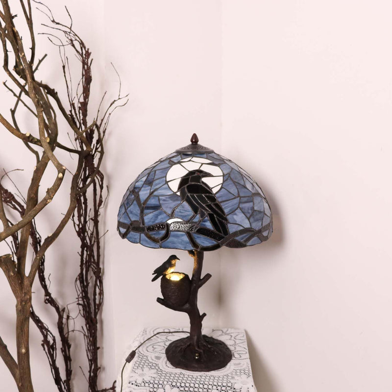L50968 Raven Sitting on Bare Tree Branch