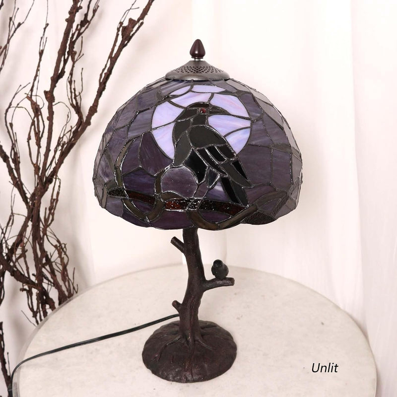 L50968 Raven Sitting on Bare Tree Branch